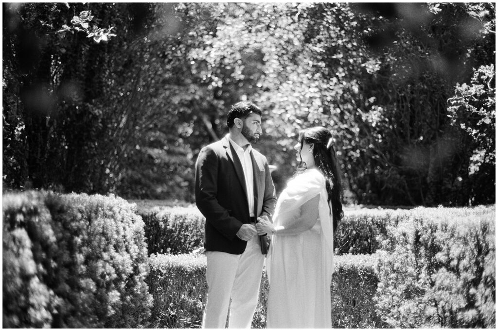 Pakistani couple during their black and white engagement photo session at Riverwood Conservancy in the GTA, captured on film with natural contrast and an elegant, storytelling style.