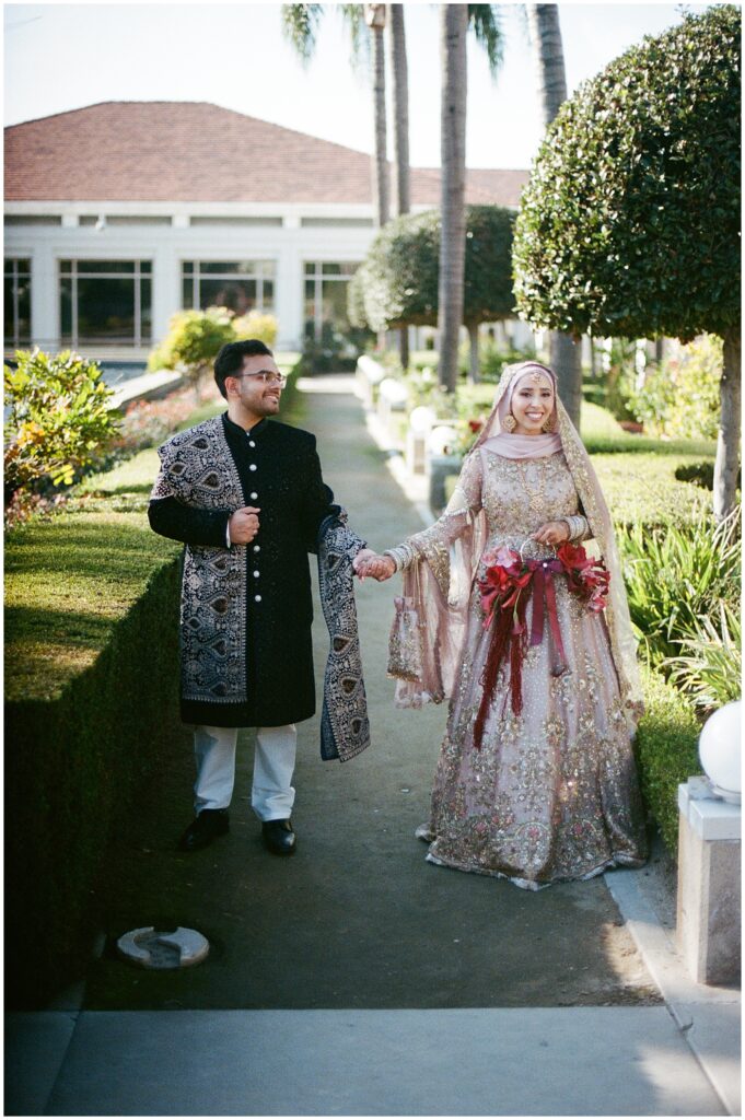A joyful nikah moment filled with love and laughter, preserved on 35mm film.