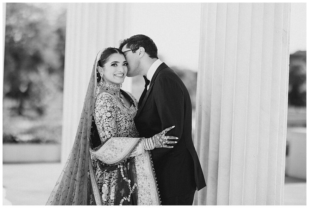 Pakistani bride and groom posing for Valima portraits at AKG Museum in Buffalo NY