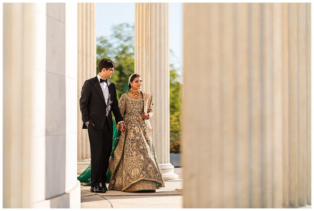 Pakistani bride and groom posing for Valima portraits at AKG Museum in Buffalo NY