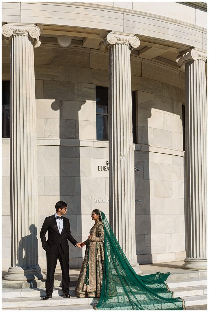 Pakistani bride and groom posing for Valima portraits at AKG Museum in Buffalo NY