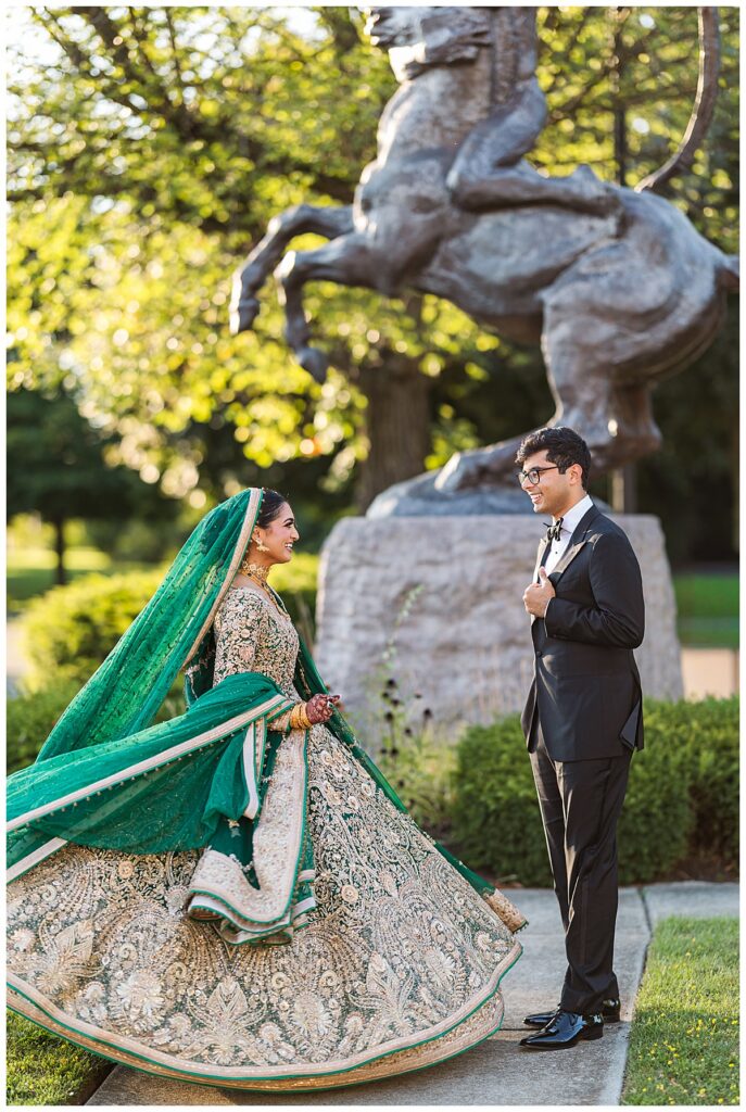 Pakistani bride and groom posing for Valima portraits at AKG Museum in Buffalo NY Buffalo History Museum